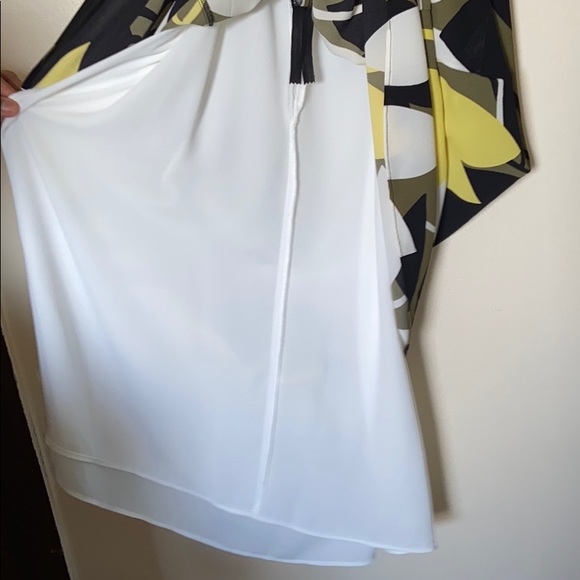 A spaghetti strap sun dress. - Picture 3 of 4